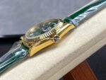 8+ Factory Counterweight Rolex Day-Date 36mm 128238-0130 Yellow Gold Crocodile Leather Strap Baguette Diamond Green Dial - Image 6
