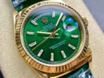 8+ Factory Counterweight Rolex Day-Date 36mm 128238-0130 Yellow Gold Crocodile Leather Strap Baguette Diamond Green Dial - Image 2
