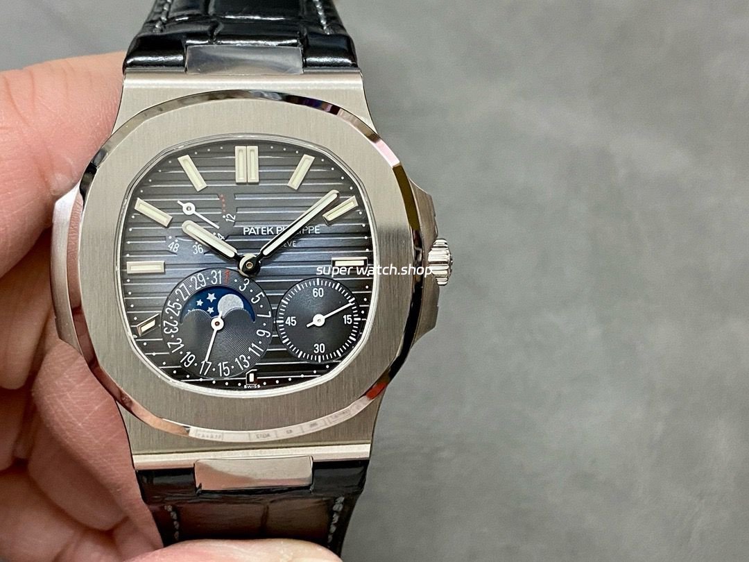 PPF-Factory-Patek-Philippe-Nautilus-40mm-5712G-001-White-Gold-Leather-Blue-Dial-2.jpg PPF Factory Patek Philippe Nautilus 40mm 5712G-001 White Gold Leather Blue Dial - Image 1